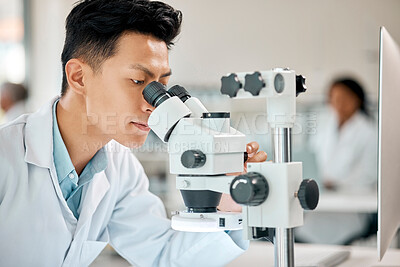 Buy stock photo Healthcare, science and microscope with an asian man doctor working in a lab for research or innovation. Medical, investigation and experiment with a male scientist in a laboratory for analysis