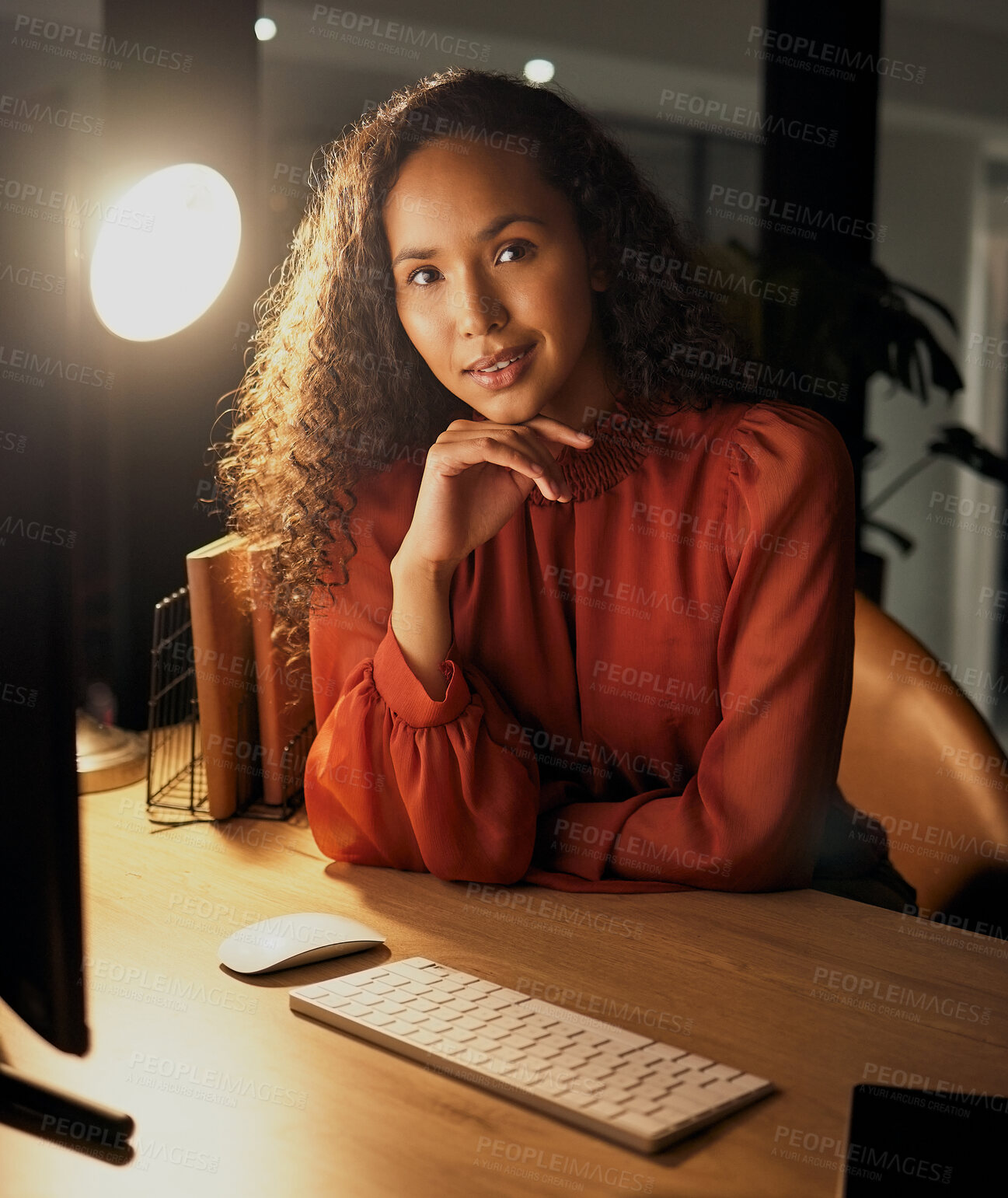 Buy stock photo Portrait, business woman and night by office desk with working overtime, computer and thinking. Female employee, smile and contemplating for startup ideas, online report and pc connection in dark