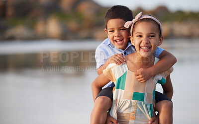 Buy stock photo Shot of an adorable brother and sister bonding at the beach