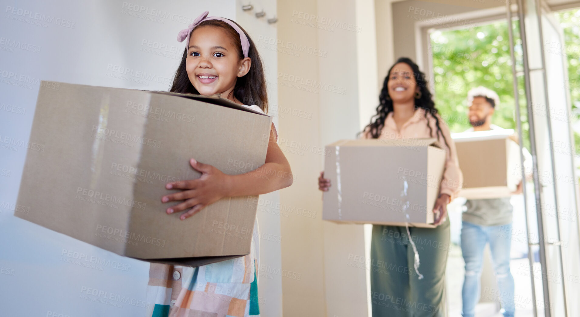Buy stock photo Happy family, real estate and box moving in new home for property, mortgage loan or investment. Mother, father and child with smile, walking and carrying boxes for relocation or renovation in house