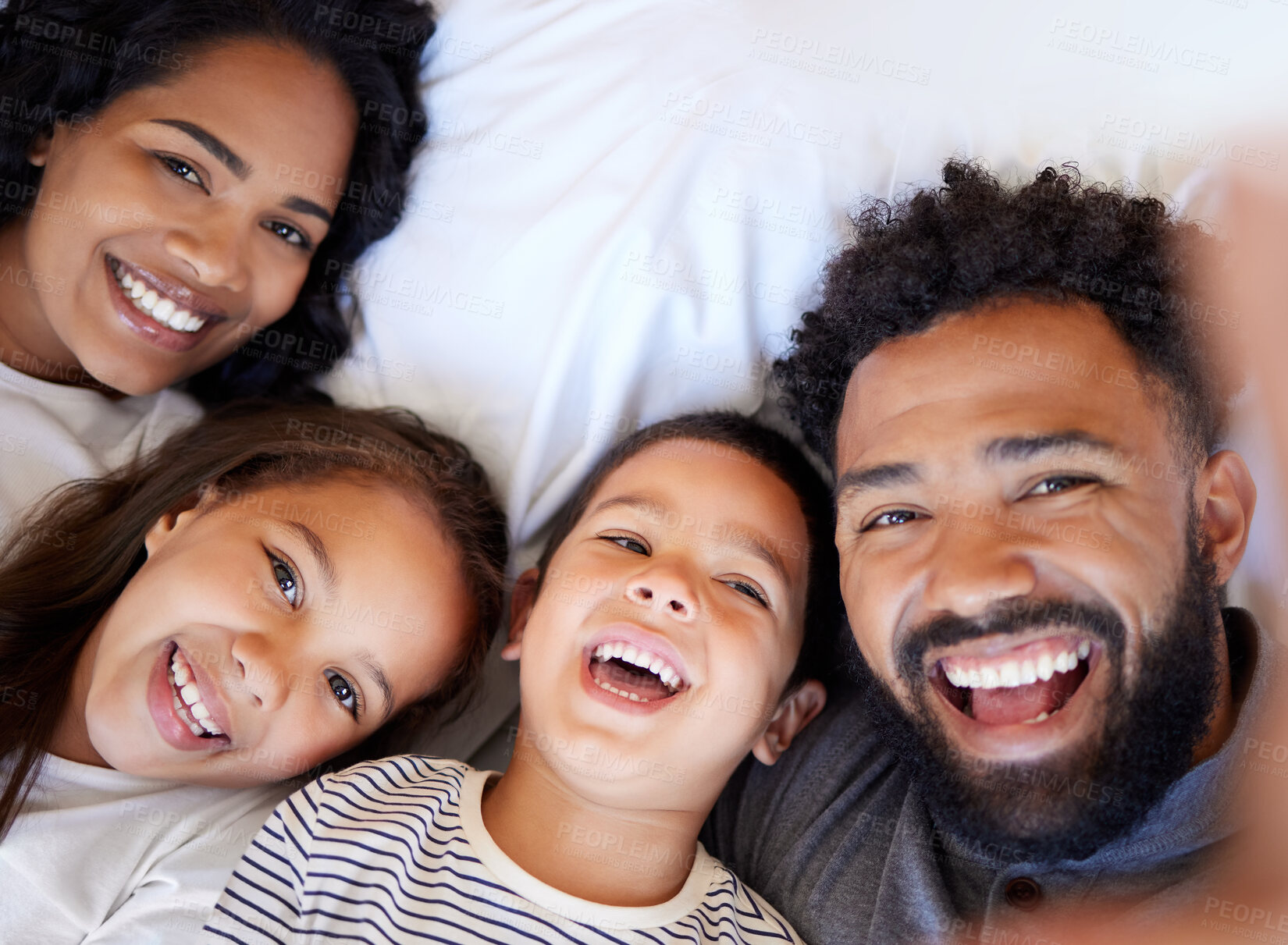 Buy stock photo Happy family, portrait and relax with children for selfie, memory or photography on bed at home. Father, mother and kids lying in bedroom with smile for morning, moment or picture together at house