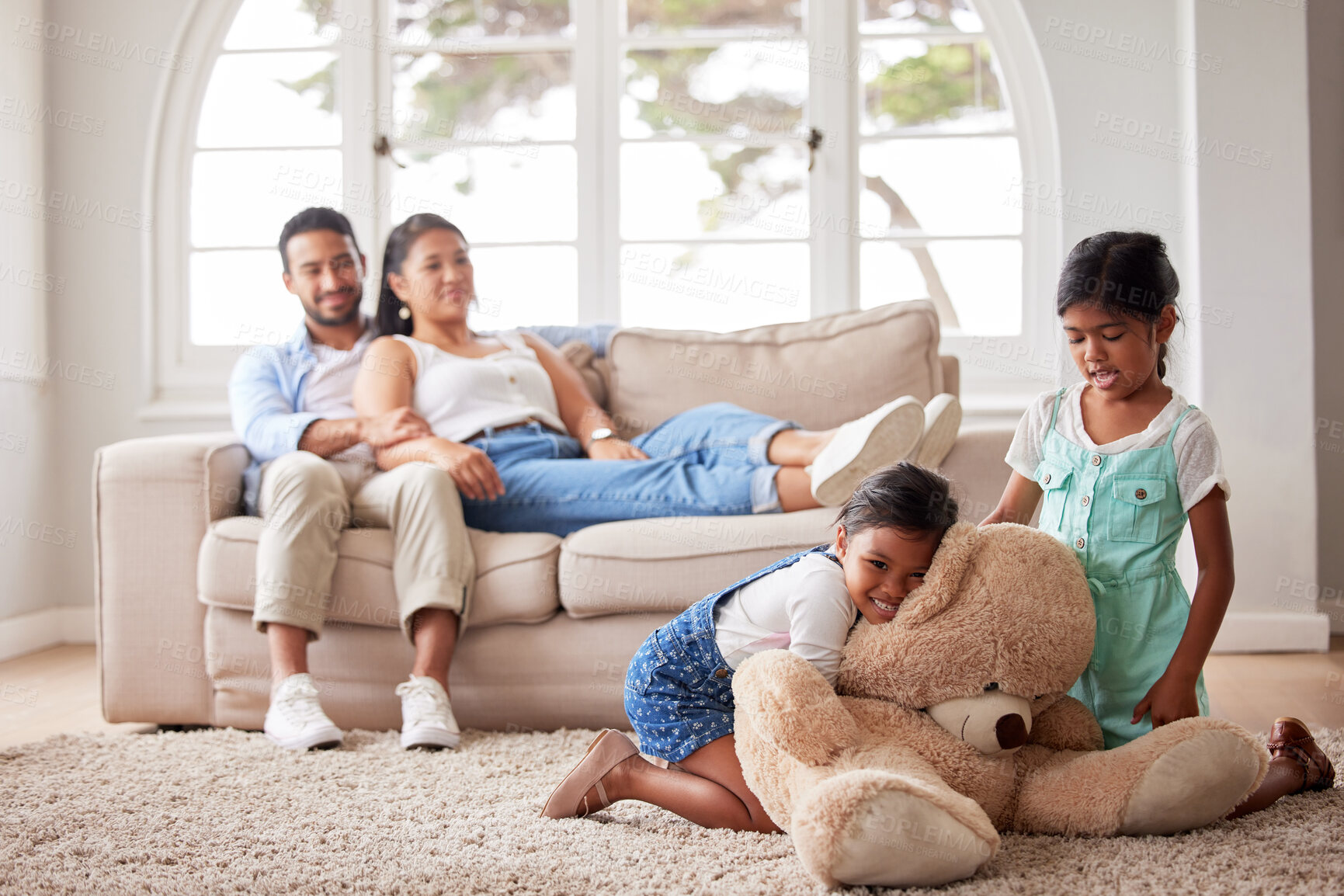 Buy stock photo Girl, sister and playing with teddy bear in home on carpet for bonding, fun activity and fantasy game. Parents, siblings and happy with fluffy toy on floor with child development, love or care on mat