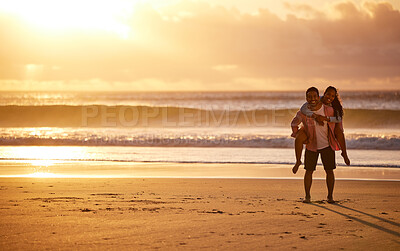Buy stock photo Shot of a couple spending time together at the beach