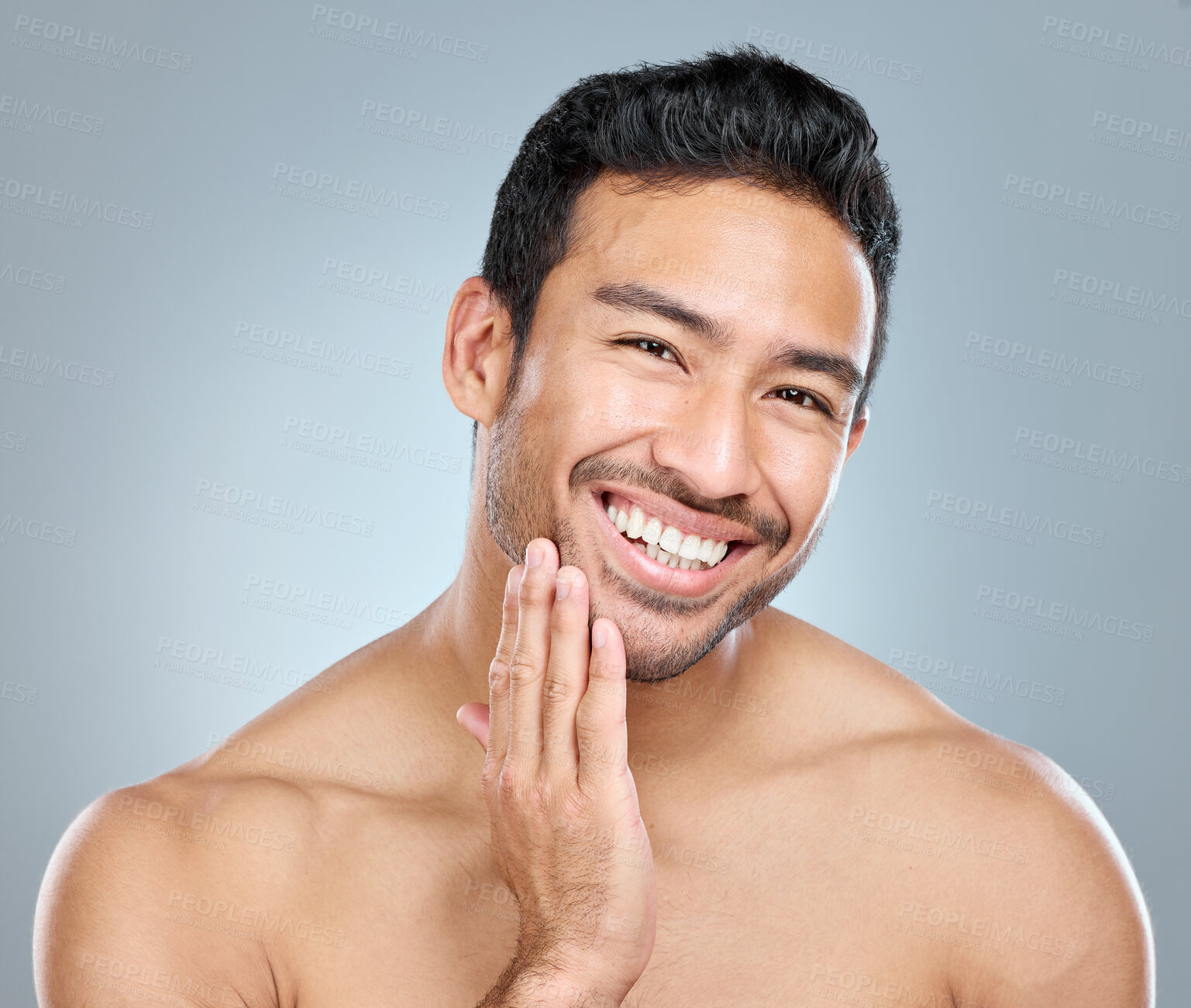 Buy stock photo Beauty, facial and grooming with portrait of man in studio on gray background for cosmetic wellness. Dermatology, natural and skincare with face of happy person in bathroom for hydration or hygiene