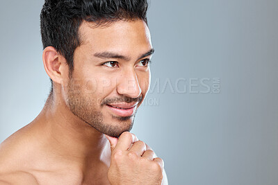 Buy stock photo Hand, man and idea dermatology in studio for skincare, grooming and wellness or pride for glow. Male model, inspiration and facial or treatment for shine, routine and hygiene by gray background