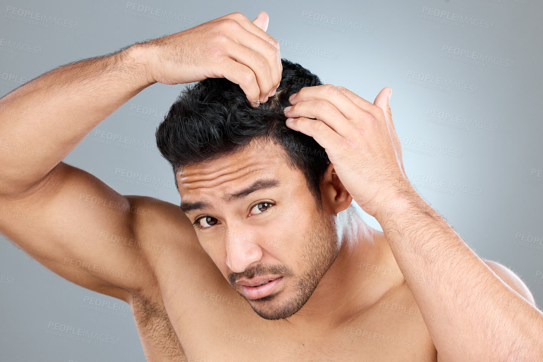 Buy stock photo Hair care, dandruff or portrait of man in studio for dry scalp treatment, worry or grooming. Male person, concern or stress on gray background for coconut oil, salicylic acid and remedy for head itch