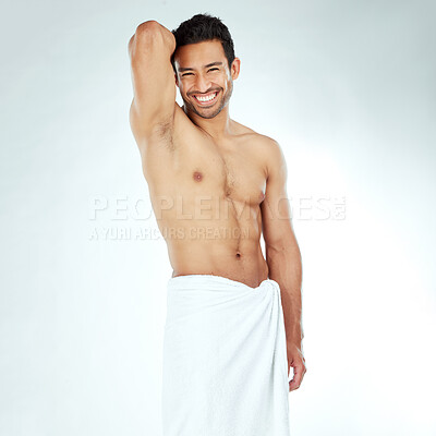 Buy stock photo Portrait, body and happy asian man with a towel in studio for shower, wellness or cosmetics on white background. Bathroom, face and Japanese male model smile for luxury pamper, grooming or treatment