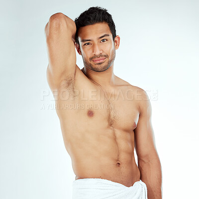 Buy stock photo Shower, towel and portrait of fitness man in studio for cleaning, wellness or cosmetics on white background. Bathroom, body and face of Japanese model with smooth skin, satisfaction or luxury pamper