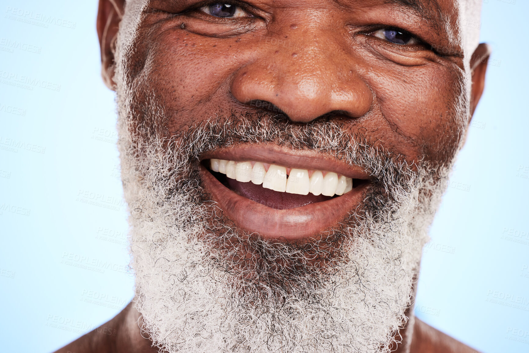 Buy stock photo Face, skincare and senior black man in studio with smile, spa treatment and wellness. Dermatology, beard care and happy elderly person on blue background for aesthetic, grooming and healthy body