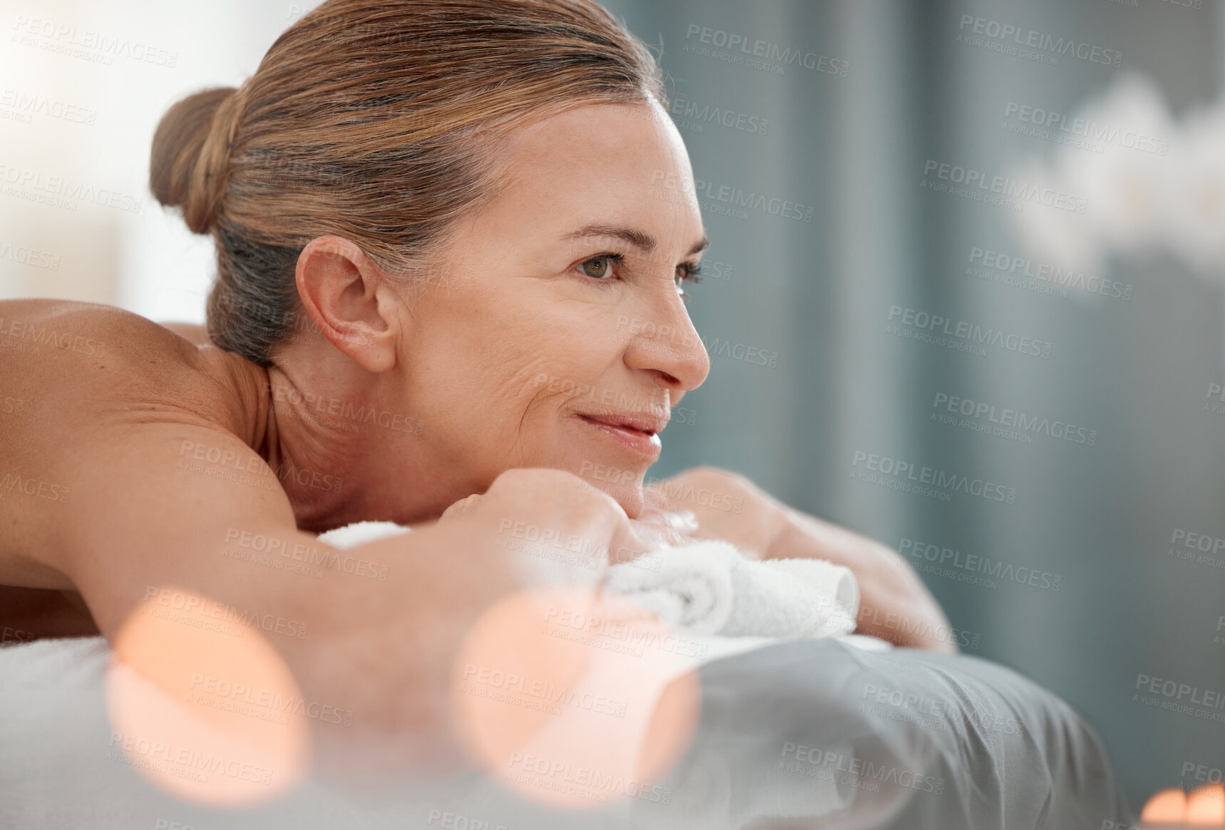 Buy stock photo Calm, woman and thinking in spa for relax, massage therapy and luxury for wellness on bed. Senior female person, memory and zen in hotel or beauty salon for holistic health, detox and self care 