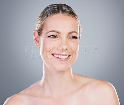 Buy stock photo Studio shot of an attractive mature woman posing against a grey background