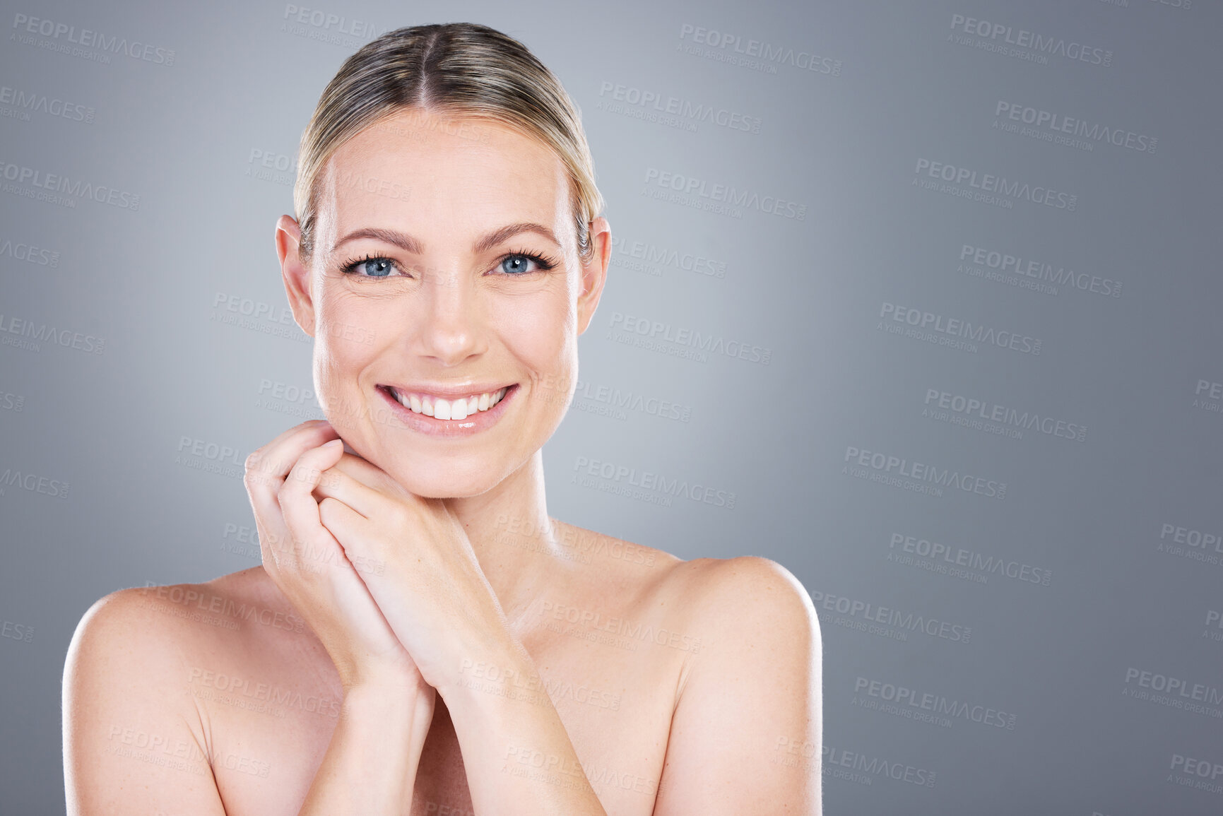 Buy stock photo Female person, portrait and smile in studio for skincare, beauty and luxury spa treatment on gray background. Woman, happy and confidence for healthy skin, self care and wellness with transformation