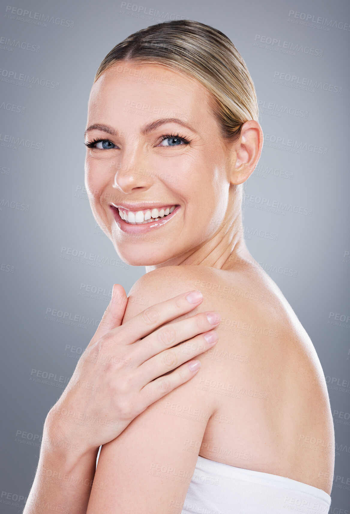 Buy stock photo Studio, shoulder and woman in portrait for skincare, wellness and health of glow for anti aging. Female model, results and treatment of beauty for cosmetics, smile and self care by gray background