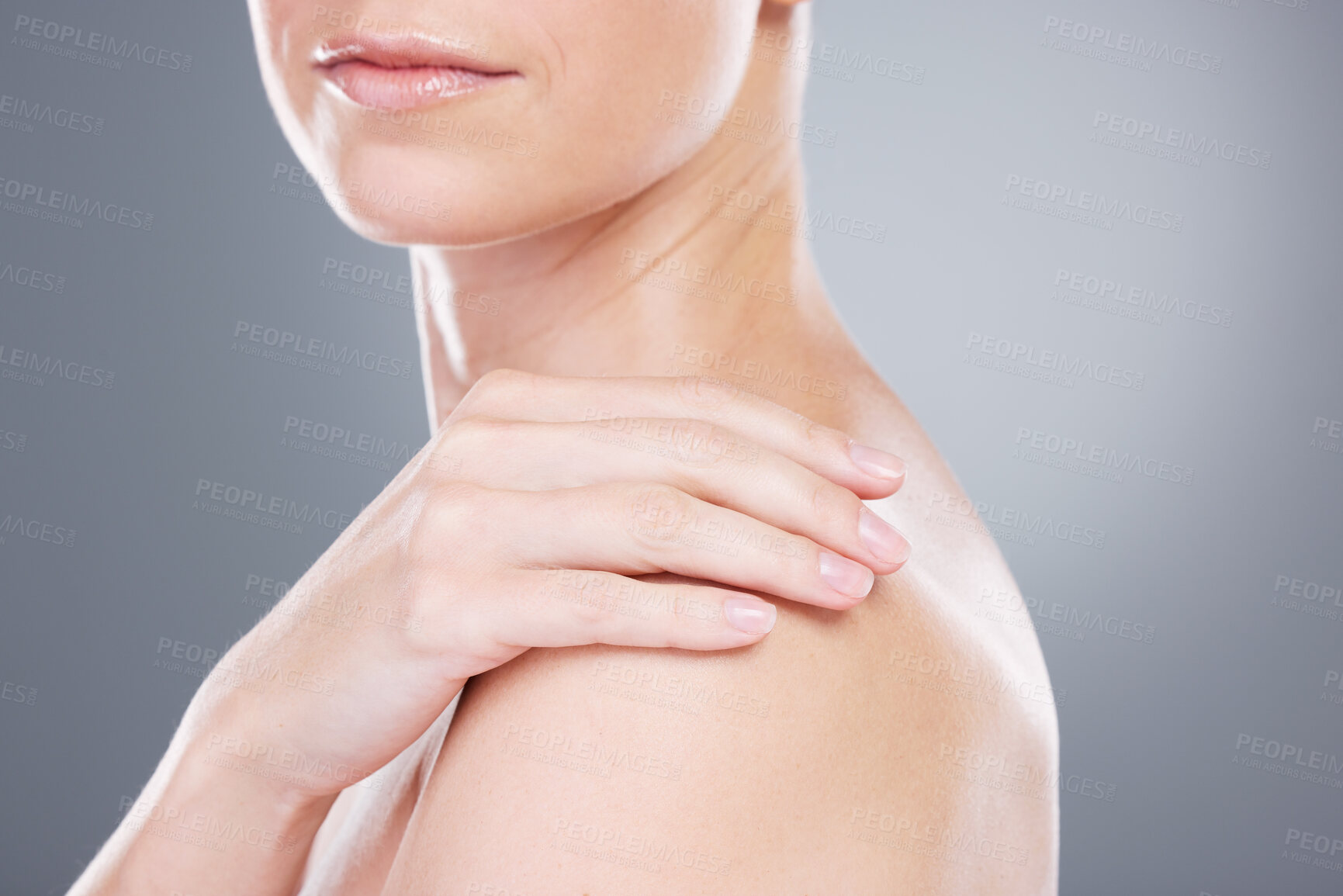 Buy stock photo Studio, skincare and shoulder of woman with soft touch, wellness and luxury skin treatment results. Dermatology, cosmetics and girl with healthy glow, texture and self care shine on grey background