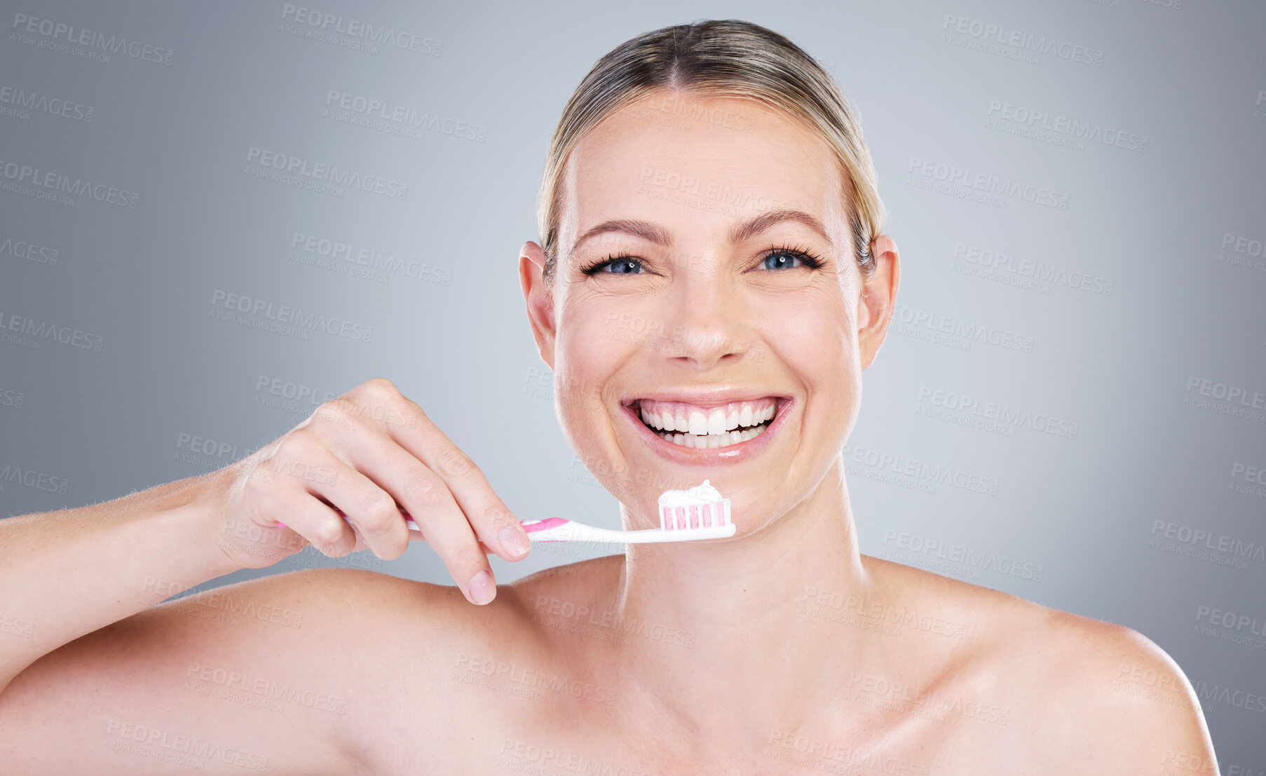 Buy stock photo Happy woman, portrait and toothbrush for cleaning in studio, cosmetics and hygiene on gray background. Female person, dental health and teeth for oral care, confidence and orthodontics healthcare