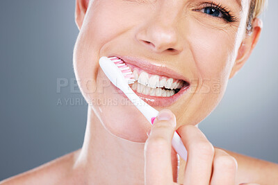 Buy stock photo Happy woman, mouth and toothbrush for dental care in studio, cosmetics and hygiene on gray background. Female person, health and teeth for oral treatment, confidence and orthodontics healthcare