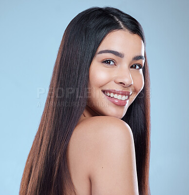 Buy stock photo Hair care, woman and beauty with dermatology, portrait or texture on blue studio background. Person, face or model with glow, volume or grooming routine with aesthetic, growth or shine with smile