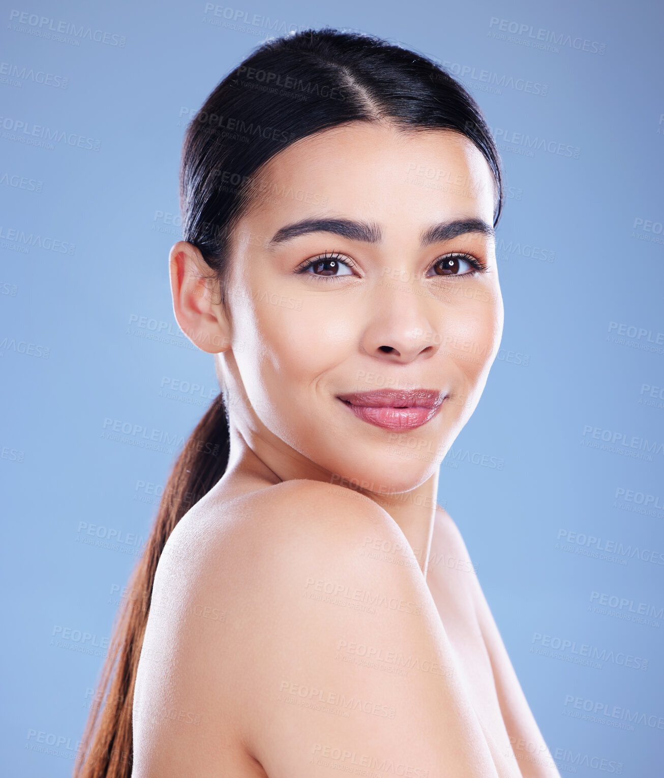 Buy stock photo Woman, confident and portrait in studio for skincare, cosmetics and happy for beauty. Female person, dermatology and smile on blue background for transformation, aesthetic and spa treatment for glow