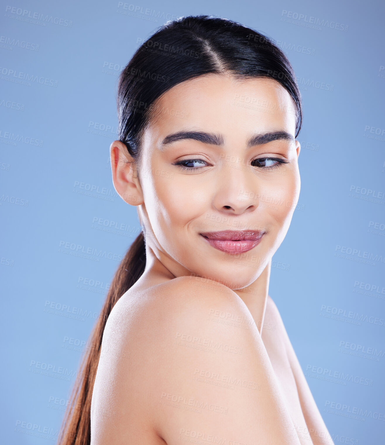 Buy stock photo Woman, happy and thinking in studio for skincare, cosmetics and confidence in beauty. Female person, dermatology and smile on blue background for transformation, aesthetic and spa treatment for glow