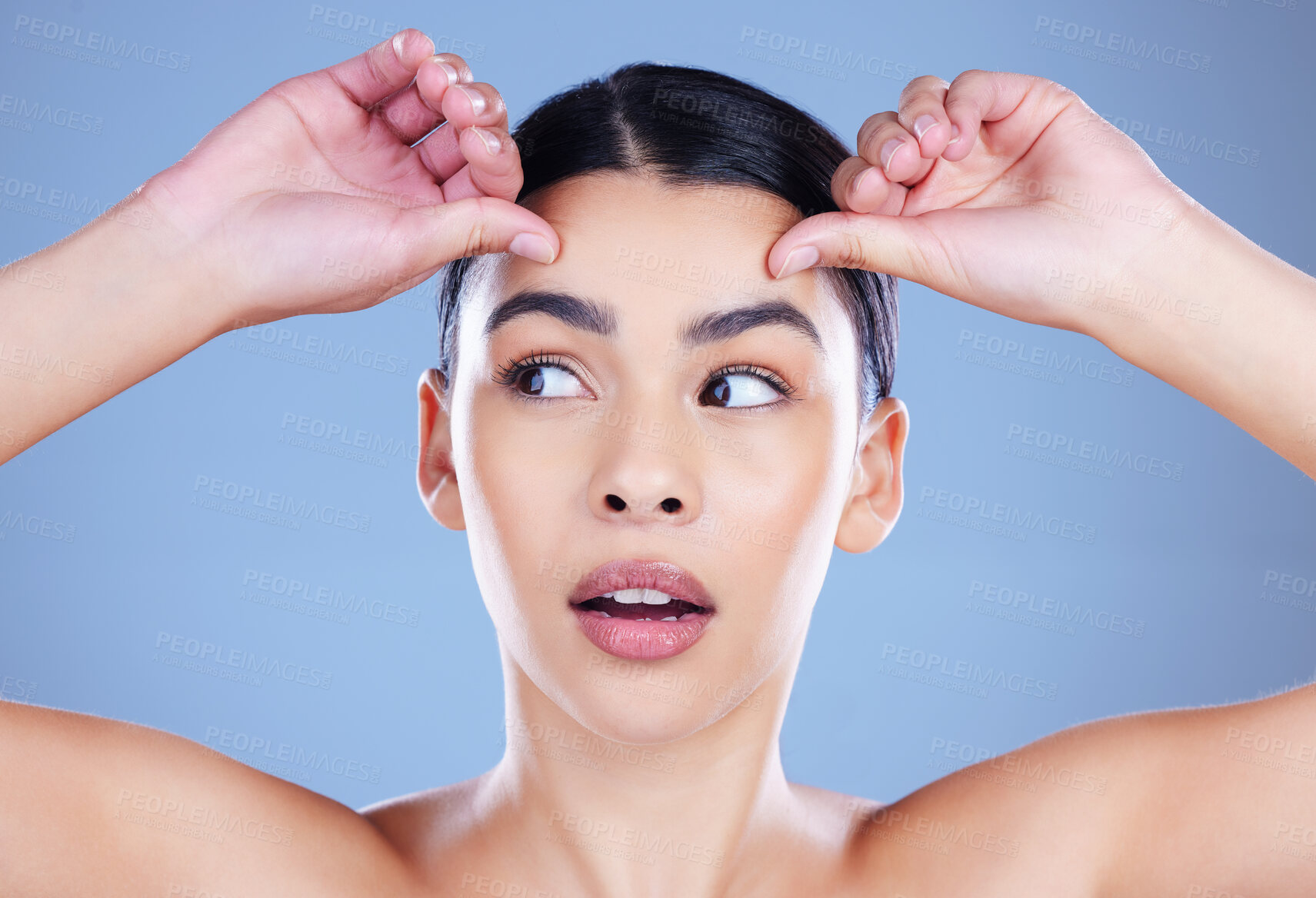 Buy stock photo Woman, thinking and stress in studio for wrinkles, cosmetics planning and blue background. Female person, ponder facial treatment and beauty transformation, dermatology and self care aesthetic