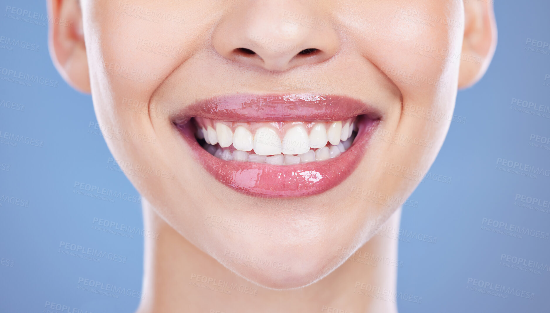 Buy stock photo Woman, smile and teeth in studio for dental wellness with hygiene, health and oral transformation. Model, mouth and orthodontics for fresh breath, healthy gums and isolated by blue background