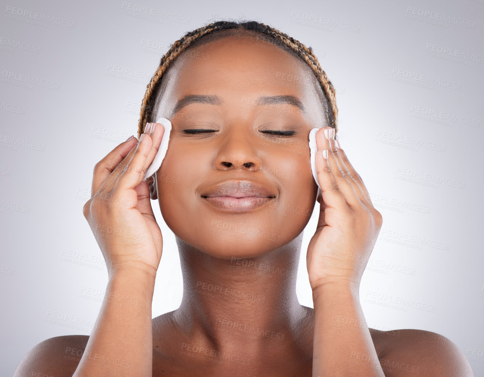 Buy stock photo Relax, studio and black woman with cleaning wipe for natural beauty, healthy skin and luxury cosmetics. Dermatology, skincare and happy girl with cotton pad, facial care and smile on white background