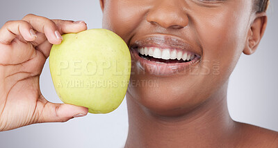 Buy stock photo Hands, apple and person in studio for diet with smile for choice, health and food by white background. Model, fruit and decision for wellness with nutrition, detox and happy in closeup to lose weight