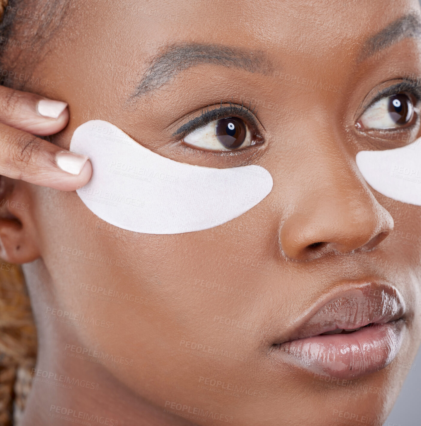 Buy stock photo Face, studio and black woman with patch on eyes for natural beauty, healthy skin or luxury cosmetics. Dermatology, thinking and girl with collagen mask, facial care and retinol skincare treatment