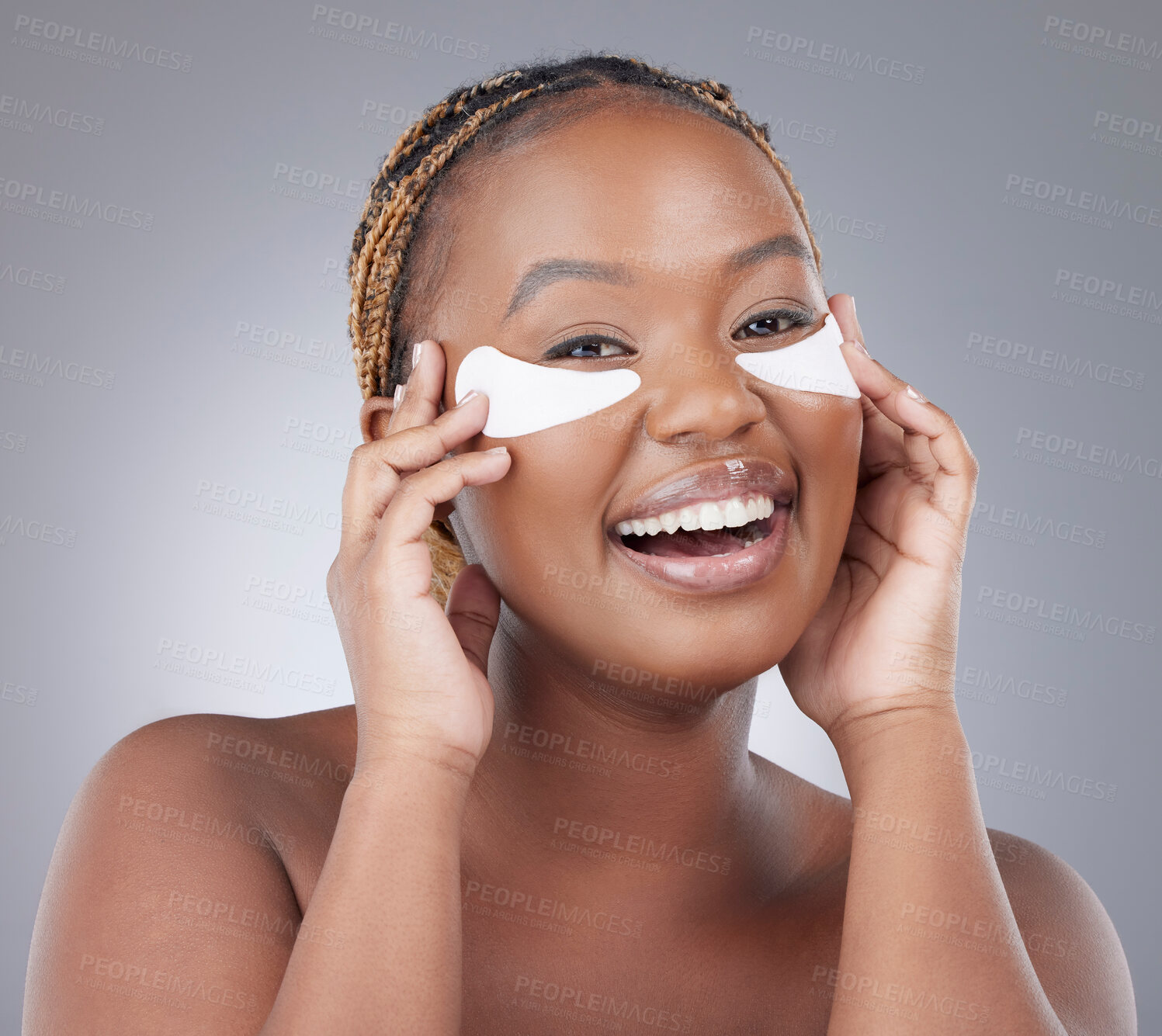 Buy stock photo Portrait, studio and black woman with patch on eyes for natural beauty, healthy skin or luxury cosmetics. Dermatology, skincare and girl with collagen mask, facial care and smile on grey background