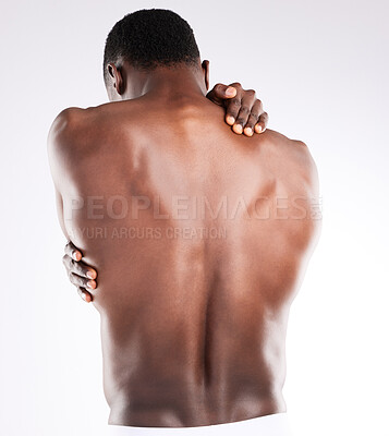 Buy stock photo Man, back and self love in studio with body, skincare and wellness with embrace on white background. Muscular model, comfort and affection with arms for care or hugging, health and appreciation

