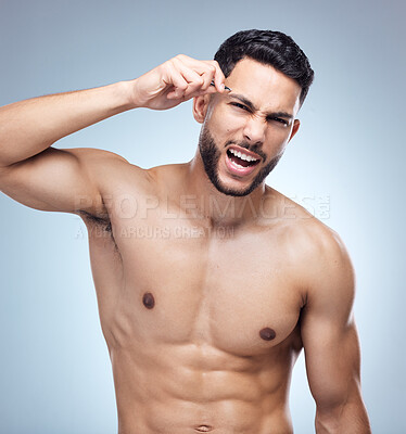 Buy stock photo Eyebrow, portrait and man with tweezers in studio for hair removal, grooming or morning routine on white background. Beauty, body and hand of model with cleaning tool for self care, wellness or salon