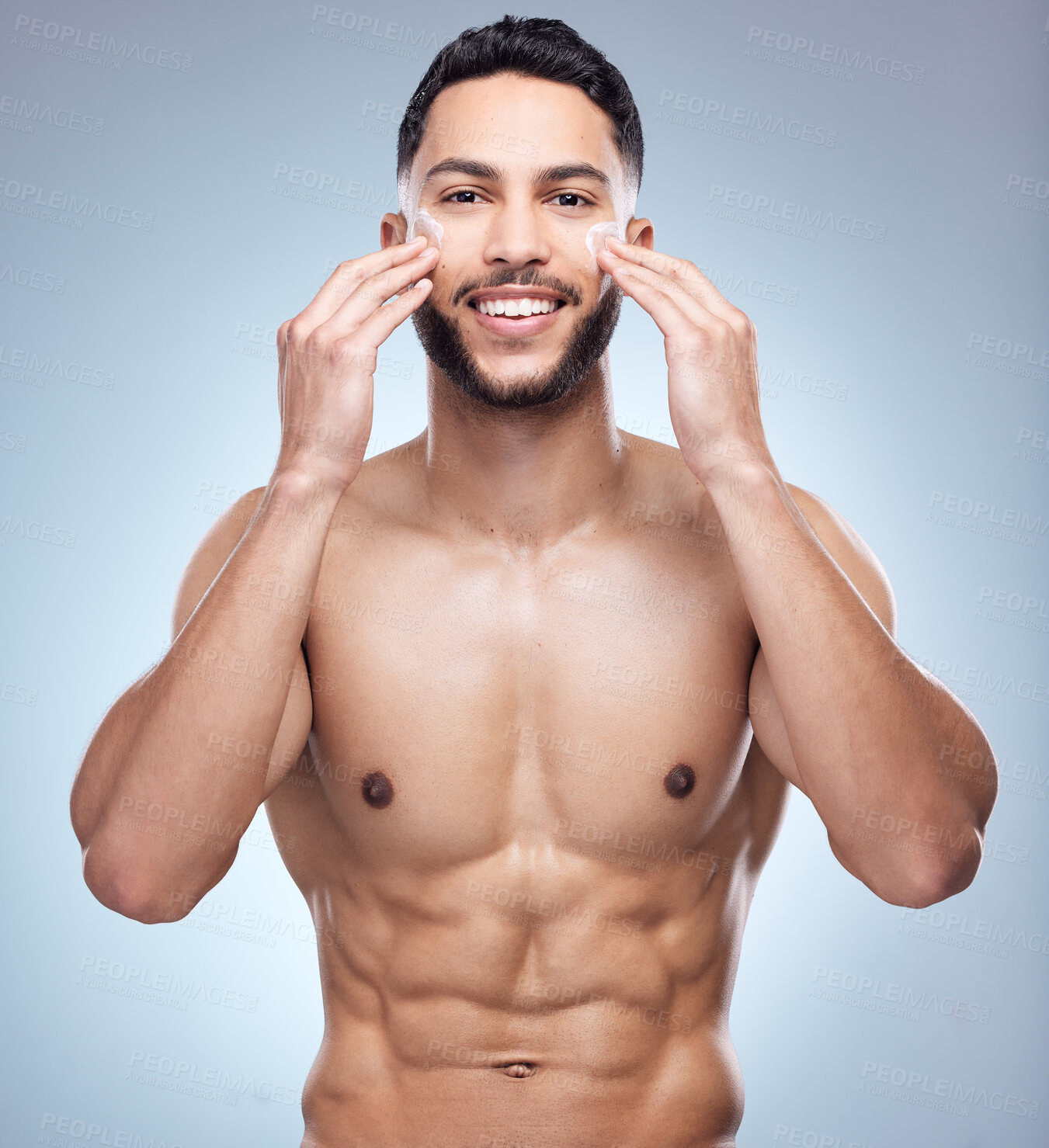 Buy stock photo Skincare portrait, hands and man with face cream for clean beauty and shine results for healthy glow in studio. Model guy, dermatology and apply sunscreen with moisture benefits by gray background