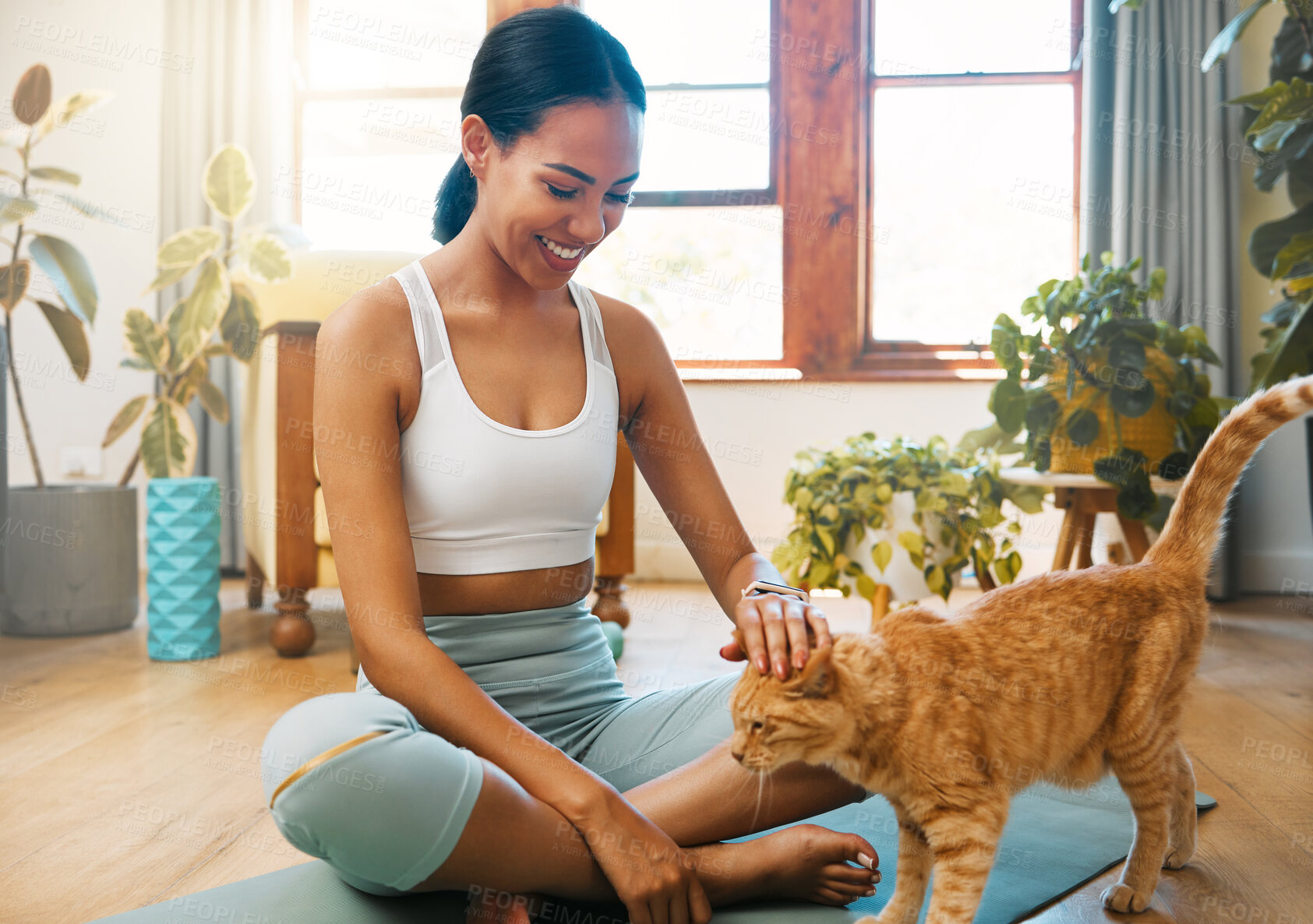 Buy stock photo Fitness, yoga or happy woman bonding with cat or pet animal relaxing for wellness or healthy lifestyle. Smile, calm or zen girl loves caring, quality time or playing with kitten or kitty at home