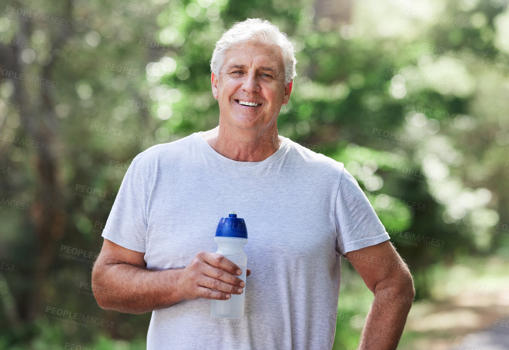 Buy stock photo Man, exercise portrait and outdoor with water bottle for run, workout and training for fitness. Senior male happy for hydration, cardio health and wellness while running in nature and retirement