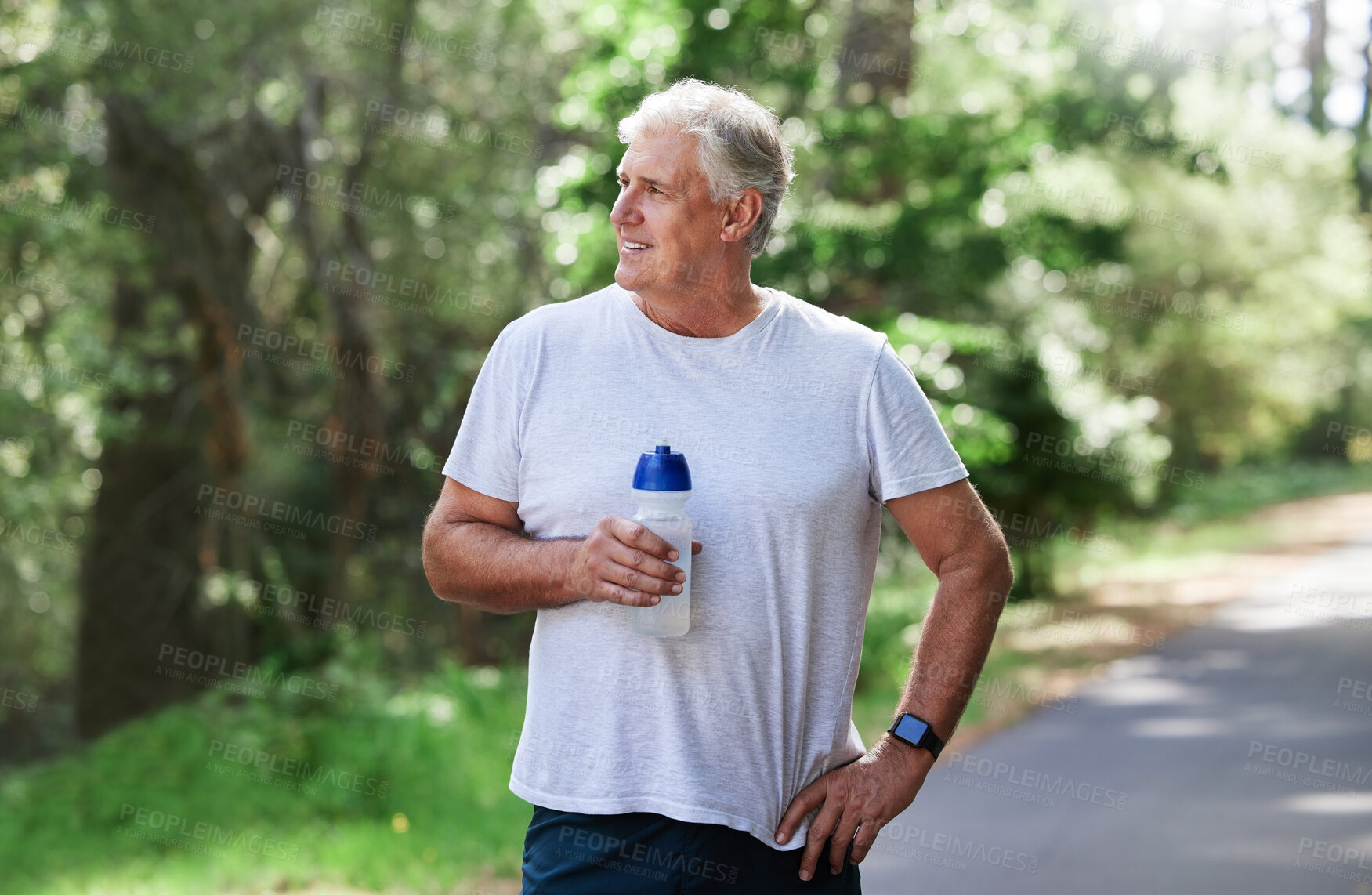 Buy stock photo Man, exercise and thinking outdoor with water bottle for a run, workout and training for fitness. Senior male happy for hydration and cardio health or wellness while running in nature in retirement