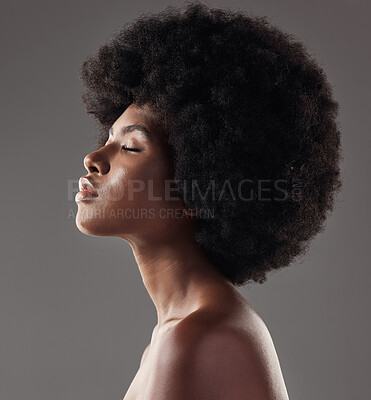 Buy stock photo Natural haircare, profile and black woman with afro hairstyle, beauty and skincare on grey background. Hair care, cosmetics and beautiful face of African model with skin glow and shine in studio.