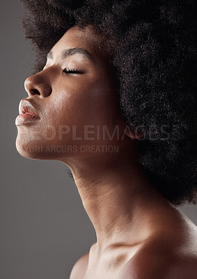 Buy stock photo Natural hair care, profile and black woman with afro hairstyle, beauty and skincare on grey background. Natural haircare, cosmetics and face closeup of African model with skin glow or shine in studio
