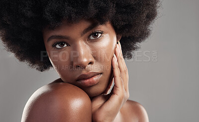 Buy stock photo Black woman, portrait and skin, natural beauty and afro hair with glow isolated on studio background. African female model, cosmetic care and hand touching face, facial and shine with skincare