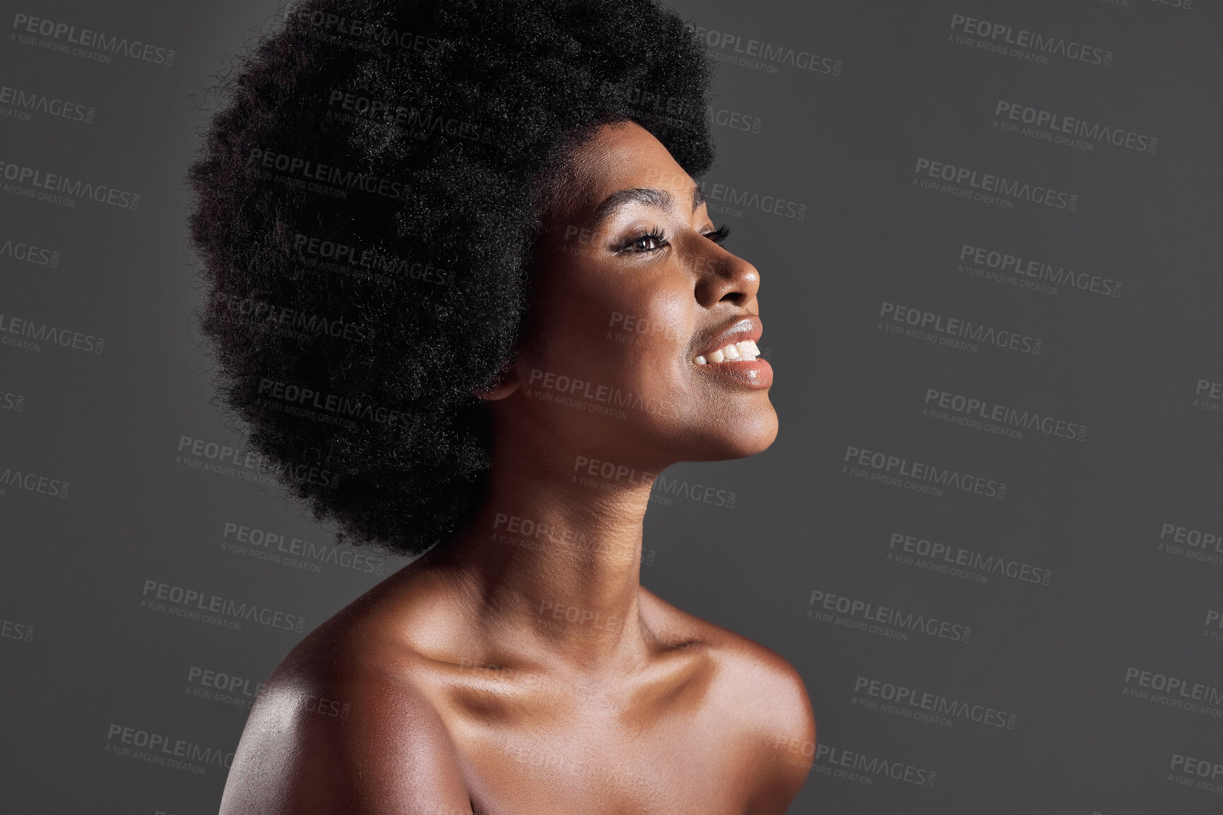 Buy stock photo Hair, smile and profile of black woman with afro hairstyle, beauty and skincare on grey background. Haircare, cosmetics and beautiful face of happy African model with skin glow and shine in studio.
