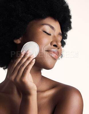 Buy stock photo Black woman, beauty and eyes closed with skincare, cotton pad and natural cosmetics on white background. Clean makeup from face, wellness and skin, African female model with glow and dermatology