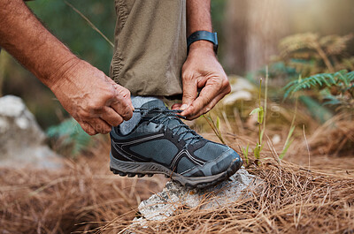 Buy stock photo Closeup, hands and tie shoes on hike, start walk and fitness for wellness, workout and exercise. Male, hiker and guy tying shoelace, prepare for hiking and training for cardio and healthy lifestyle 