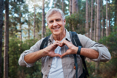 Buy stock photo Portrait, heart and senior man in forest hiking, fitness and health support, self care hands and cardiovascular workout. Nature, travel or trekking of happy person in woods with love sign or emoji