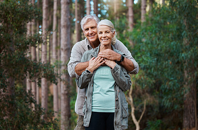Buy stock photo Forest, portrait and senior couple hug for love, retirement wellness and health in nature hiking or travel. Face of happy mature woman and partner or people together in woods, park or countryside 