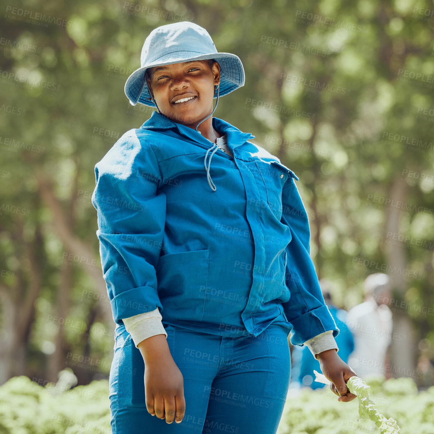 Buy stock photo Happy, portrait and black woman with hat for farming, agriculture or global warming in nature. Young Nigerian, female person or farmer with smile or vegetables for natural development in Nigeria