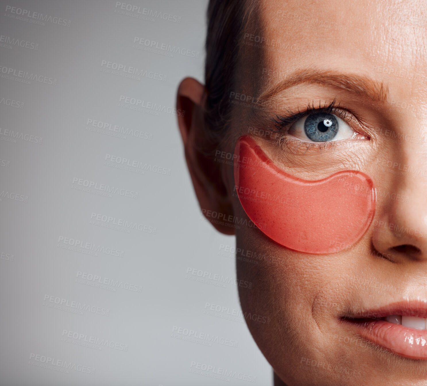 Buy stock photo Portrait, woman and eye mask for skincare, beauty and collagen treatment on mockup. Patch, mature model and cosmetics on face for dermatology, anti aging and half closeup on gray studio background