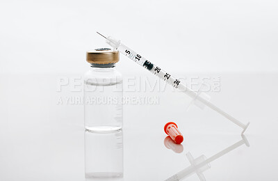 Buy stock photo Pharmacy, syringe and drug vial for vaccine, medication and illness or cure on white studio background. Injection, needle and pharmaceutical product for healthcare, flu shot or equipment at clinic