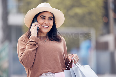 Buy stock photo Shopping, phone call and happy Indian woman in city with bag for conversation, talking and communication. Retail, fashion and female person on smartphone with bags for sale, bargain and discount