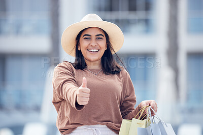 Buy stock photo Happy woman, shopping bag and thumbs up for winning, discount or sale in city outdoors. Portrait of excited female person or shopper with thumb emoji, yes sign or like for luxury sales in urban town