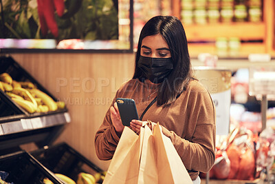 Buy stock photo Grocery store, face mask and woman with phone for shopping list, inventory and healthy food. Eco friendly, organic vegetables and girl at sustainable supermarket with paper bag, ppe or social safety