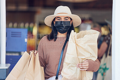 Buy stock photo Woman, face mask and shopping bag at store with sale, discount and budget with retail safety and compliance. Portrait of customer with food, groceries and virus protection for sustainable or wellness
